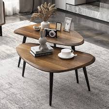 Il tavolino da caffè Mid-Century è un elegante set di tavolini a incastro